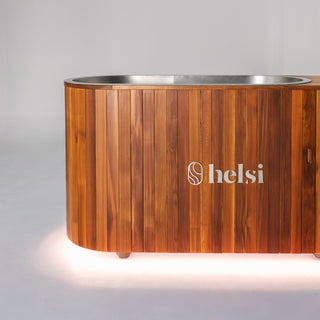 Helsi Ice Plunge - LED light. Its sleek design and premium construction, combining cedar and stainless steel, adds a touch of elegance to any wellness setting.